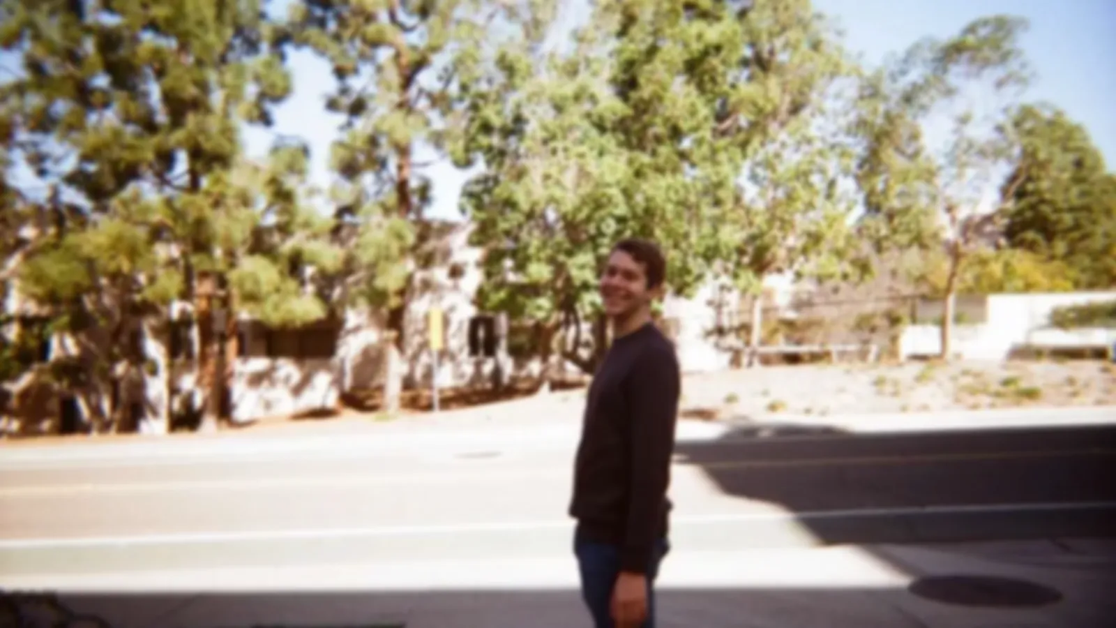 A blurred picture of Andrew Schmitz in film